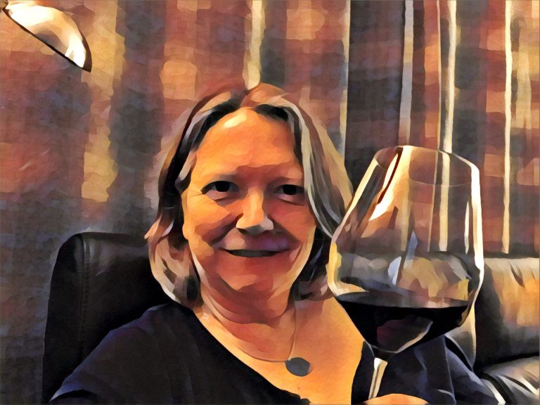 The Success Architect Julie Goddard with a glass of Malbec